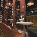 Dawn McCoy Instagram - Cheers to our dear - and talented - friend, @christopherkennedyinc on his newest design project launch, @canopywinelounge, in downtown Palm Springs. A beautifully designed space that both celebrates the desert you’re in and also makes you feel like you’re being transported to an exotic destination - Canopy is sure to be the newest hot spot for Palm Springs locals and tourists alike. From the decadent, velvet chartreuse booths to the tall, white paper trees and vegetation, you cozy up in there, thinking to yourself, “I’ve never been anywhere quite like THIS before.” And how spectacular is that? I’m also so proud to toot another friend’s horn who is involved in this opening - my wonderful friend, @lowiemoore @lawrencemooreassociates is Canopy’s PR. So you know who you need to contact if you’d like to cover it for press. I loved it so much that I’m not even slightly exaggerating when I say that I can’t wait to get back. Sure to be new favorite place to meet friends and business associates (and work solo while enjoying a glass of wine), my favorite wine I tried was their Justice Cabernet. How perfect is that? It’s a sign if you ask me.🍷 @kellygolightly and I - as well as a slew of other friends (as you can see) had the loveliest time and I can’t think of a better way to welcome in the holidays than hugging friends while celebrating other friends’ successes. ☺️🎄❤️ Kelly and I even sported her @kellygolightly x @bethladdcollections swan earrings and clutches and our @jouercosmetics x @lovingwayfoundation lip kits.💋 My ensemble: @trinaturk - styled by @denise_in_socal My shoes: @seychellesshoes at @trinaturk @shopelpaseo Palm Springs, California