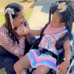 Dawn McCoy Instagram - Happy Birthday Week, Christi Jo! 🎂🎂 Waylon & I got to know Christi Jo & her amazing mama @b___day through our therapies at the same treatment center and then we got to connect on a personal level at @holtonsheroes HEROween - and then again at @lovingwayfoundation HALLOway. It was at HEROween where Christi Jo’s mama captured this sweet moment between Christi Jo & I. It broke my heart wide open then and brings tears to my eyes even today. It takes SO much energy, effort and focus for our kiddos to control their motor movements - so when Christi Jo reached up to touch my face? Well…I knew that meant that we were friends.🥰 Please join me in wishing Christi Jo a happy birthday and let’s send some extra love her way by commenting below.🩷🎂🎂🎂 #HoltonsHeroes #LovingWayFoundation Los Angeles, California