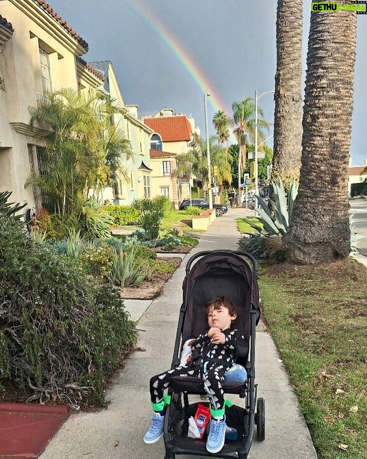 Dawn McCoy Instagram - Justice IS coming. Even God wanted us to know that it is - and sent us a clear sign today.🌈🌈 On today of all days… We got a rainbow on Waylon’s Survivorversary. We’re big believers in signs over here - and for good reason. On the day the ER told me Waylon had bleeding on the brain and were intubating him - before I found out why - I hit my knees, bawling in the emergency room bathroom, and begged God for Waylon to survive and to not be in a vegetative state. I very specifically asked him for signs that he would LIVE. Minutes later, I rode with Waylon in an ambulance to the NICU in another city. I pulled out my phone to call someone and my Instagram came up - and there was Natalie Maines of The Chicks. I KNEW IT WAS MY SIGN. I sang Waylon “Lullaby” throughout my pregnancy and when he was born and was crying as we were transported to recovery, I sang the song to him and he inhaled sharply and like - “That’s been you?” and immediately stopped crying. He knew my voice and it gave him comfort. But God wasn’t done. A little bit up the way, I saw a billboard: “Big Tex’s Trailers.” When I was pregnant, we had referred to Waylon as “Baby Tex” because I believed I needed to see his sweet face before I named him. Even after he was born, friends still referred to him as “Baby Tex.” I asked myself, “What do trailers do? They PULL!!!! Waylon is going to pull through!” I took it as a sign and knew in my heart of hearts that Waylon would LIVE. God, we heard you then…and we hear you now. Loud and clear. Thank you.🩵🩷 (And thank you to those of you who sent us photos of the rainbow - and to our sweet caregiver, Nadalea, who took this sweet photo on Way’s walk this afternoon) Los Angeles, California