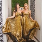 Dawn McCoy Instagram - Stepping into 2024 straight-up Charlie’s Angels-style with @EliseJoanFitness. Clad in matching gold… Ready to catch the bad guys and put them away for good…. And live our very best lives.✨✨✨ p.s. This is age 46 (Dawn) and 48 (Elise). The gold dress: @kylexshahida at @thegardensonelpaseo 📷: @andrewcabral_photography Palm Desert, California