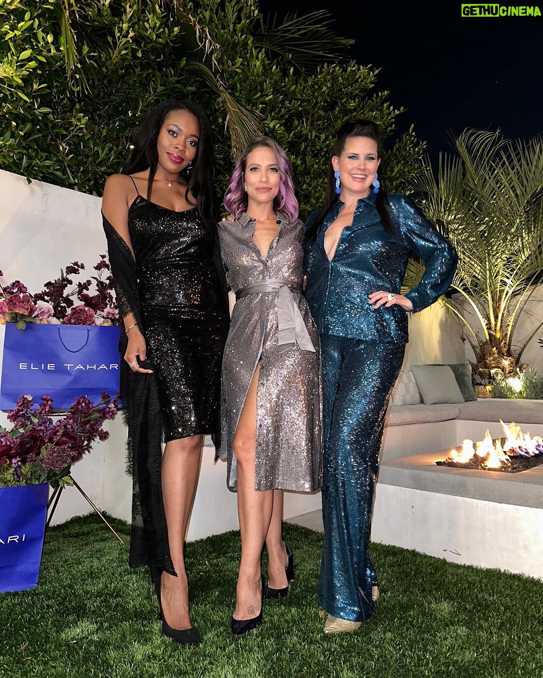 Dawn McCoy Instagram - An @ElieTahari Friendsgiving at sunset hosted by my beautiful friend @elizabethkeene was just what my already full heart needed to kick off the holiday season. Filled with fierce female friends I love - and some friends I haven’t seen in WAY too long - it was just a night filled with love, encouragement and truth talk. I can’t wait to share more tomorrow. But for now… Thank you, @elietahari for dressing me and making my Lynda Carter-meets-Joan Collins-meets-David Bowie sapphire-sequined dreams come true with this beautiful ensemble.💙🩵 Thank you, @christophermilesmakeup for bringing this beauty look to life with @lancomeofficial & @nyxcosmetics. And, thank you @kellygolightly x @bethladdcollections for this stunning swan clutch from your collaboration capsule.🦢🦢🦢 I was so honored to debut it in Los Angeles and can’t wait to don it tomorrow again for the Black & White Ball. 🖤🤍🦢 #ElieGirl #ElieTahariCollection #FallInLoveWithLuxury #FallingForLuxury Wearing @elietahari Swan beaded clutch: @kellygolightly x @bethladdcollections Makeup: @christophermilesmakeup Hair: Adriana Shoes: @seychellesshoes at @trinaturk @denise_in_socal Event details: 📷: @irik Catering: @eats_by_connor Wine: @boeschenvineyards 🍷 Beauty details: @nyxcosmetics butter gloss in crème brulee @lancomeofficial eyeshadow @makeupbymario blush @chanelofficial foundation @charlottetilbury bronzer & eyeliner Manhattan Beach, California