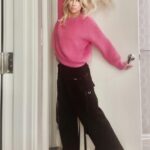Debbie Gibson Instagram - My favorite pink sweater and me 💞 Post Show Friday Night 12/8 🎵 Swipe for all the variations on the theme🍸 #wednesday #wednesdaymotivation #sweater #sweaterweather #stellamccartney Shout out to @Skyla.Ann at @stellamccartney in LV for helping me pick the perfect fit … cute but just baggy enough to feel cozy ! We had FUN finding it 💗 Burbank, California
