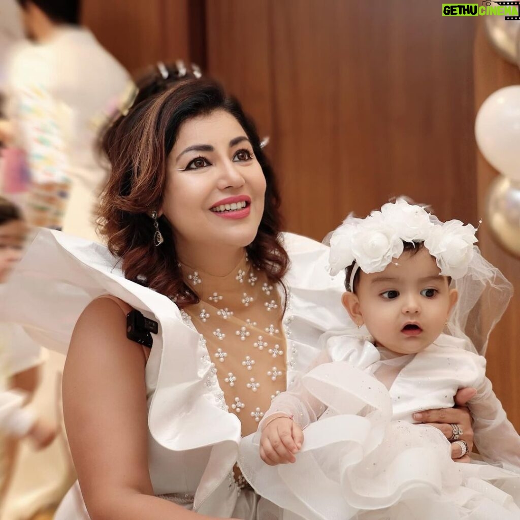 Debina Bonnerjee Instagram - It seems just yesterday that this little wonder came into our life and I can’t thank God enough for this surprise for me… This little wonder reinstates the fact that we plan something but God has a different and a much better plan for us.. I looooove you my Chiku to 1000 times the moon and back. My darling divisha , my little wonder. Every picture is a story meticulously thought of dress code … white being the colour of dream , a surreal feeling.. of beauty , of divinity, of wonder Wings yes simply a fairy.. but also wishing the babies the courage to fly .. we as parents would be the wind God bless you my darlings 🪽🤍 . . Debina outfit : @shilpsaxena Gurmeet outfit : @shilpsaxena Babies outfit : @firstlittlesmileindia . . . #celebration