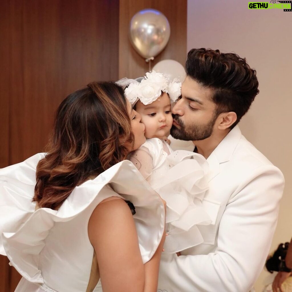 Debina Bonnerjee Instagram - It seems just yesterday that this little wonder came into our life and I can’t thank God enough for this surprise for me… This little wonder reinstates the fact that we plan something but God has a different and a much better plan for us.. I looooove you my Chiku to 1000 times the moon and back. My darling divisha , my little wonder. Every picture is a story meticulously thought of dress code … white being the colour of dream , a surreal feeling.. of beauty , of divinity, of wonder Wings yes simply a fairy.. but also wishing the babies the courage to fly .. we as parents would be the wind God bless you my darlings 🪽🤍 . . Debina outfit : @shilpsaxena Gurmeet outfit : @shilpsaxena Babies outfit : @firstlittlesmileindia . . . #celebration