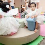 Debina Bonnerjee Instagram - It seems just yesterday that this little wonder came into our life and I can’t thank God enough for this surprise for me… This little wonder reinstates the fact that we plan something but God has a different and a much better plan for us.. I looooove you my Chiku to 1000 times the moon and back. My darling divisha , my little wonder. Every picture is a story meticulously thought of dress code … white being the colour of dream , a surreal feeling.. of beauty , of divinity, of wonder Wings yes simply a fairy.. but also wishing the babies the courage to fly .. we as parents would be the wind God bless you my darlings 🪽🤍 . . Debina outfit : @shilpsaxena Gurmeet outfit : @shilpsaxena Babies outfit : @firstlittlesmileindia . . . #celebration