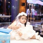 Debina Bonnerjee Instagram - It seems just yesterday that this little wonder came into our life and I can’t thank God enough for this surprise for me… This little wonder reinstates the fact that we plan something but God has a different and a much better plan for us.. I looooove you my Chiku to 1000 times the moon and back. My darling divisha , my little wonder. Every picture is a story meticulously thought of dress code … white being the colour of dream , a surreal feeling.. of beauty , of divinity, of wonder Wings yes simply a fairy.. but also wishing the babies the courage to fly .. we as parents would be the wind God bless you my darlings 🪽🤍 . . Debina outfit : @shilpsaxena Gurmeet outfit : @shilpsaxena Babies outfit : @firstlittlesmileindia . . . #celebration