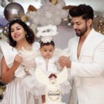 Debina Bonnerjee Instagram - It seems just yesterday that this little wonder came into our life and I can’t thank God enough for this surprise for me… This little wonder reinstates the fact that we plan something but God has a different and a much better plan for us.. I looooove you my Chiku to 1000 times the moon and back. My darling divisha , my little wonder. Every picture is a story meticulously thought of dress code … white being the colour of dream , a surreal feeling.. of beauty , of divinity, of wonder Wings yes simply a fairy.. but also wishing the babies the courage to fly .. we as parents would be the wind God bless you my darlings 🪽🤍 . . Debina outfit : @shilpsaxena Gurmeet outfit : @shilpsaxena Babies outfit : @firstlittlesmileindia . . . #celebration