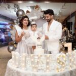 Debina Bonnerjee Instagram - It seems just yesterday that this little wonder came into our life and I can’t thank God enough for this surprise for me… This little wonder reinstates the fact that we plan something but God has a different and a much better plan for us.. I looooove you my Chiku to 1000 times the moon and back. My darling divisha , my little wonder. Every picture is a story meticulously thought of dress code … white being the colour of dream , a surreal feeling.. of beauty , of divinity, of wonder Wings yes simply a fairy.. but also wishing the babies the courage to fly .. we as parents would be the wind God bless you my darlings 🪽🤍 . . Debina outfit : @shilpsaxena Gurmeet outfit : @shilpsaxena Babies outfit : @firstlittlesmileindia . . . #celebration