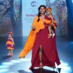 Debina Bonnerjee Instagram - Moments like this ❤️ This one is obviously the most special #iykyk 😉 Thank you @shivanee_saraf for putting across sucha beautiful thought for @barrooni.in collection The thought : To be structured and messy at the same time and every “mother” will just get it since we are on a role to shine get our confident going, keep things structured and yet we are messy too haha!! To good times and making the best memories with my little girls❤️ . Outfit both mommy babies : @barrooni.in 👠 : @Sana.k.official Hair : @irshad__hair Styled by : @simrankhera5 Managed by : @jeevitaoberoi . Thank you @timesfashionweek . . #debinabonnerjee #love #bombaytimesfashionweek
