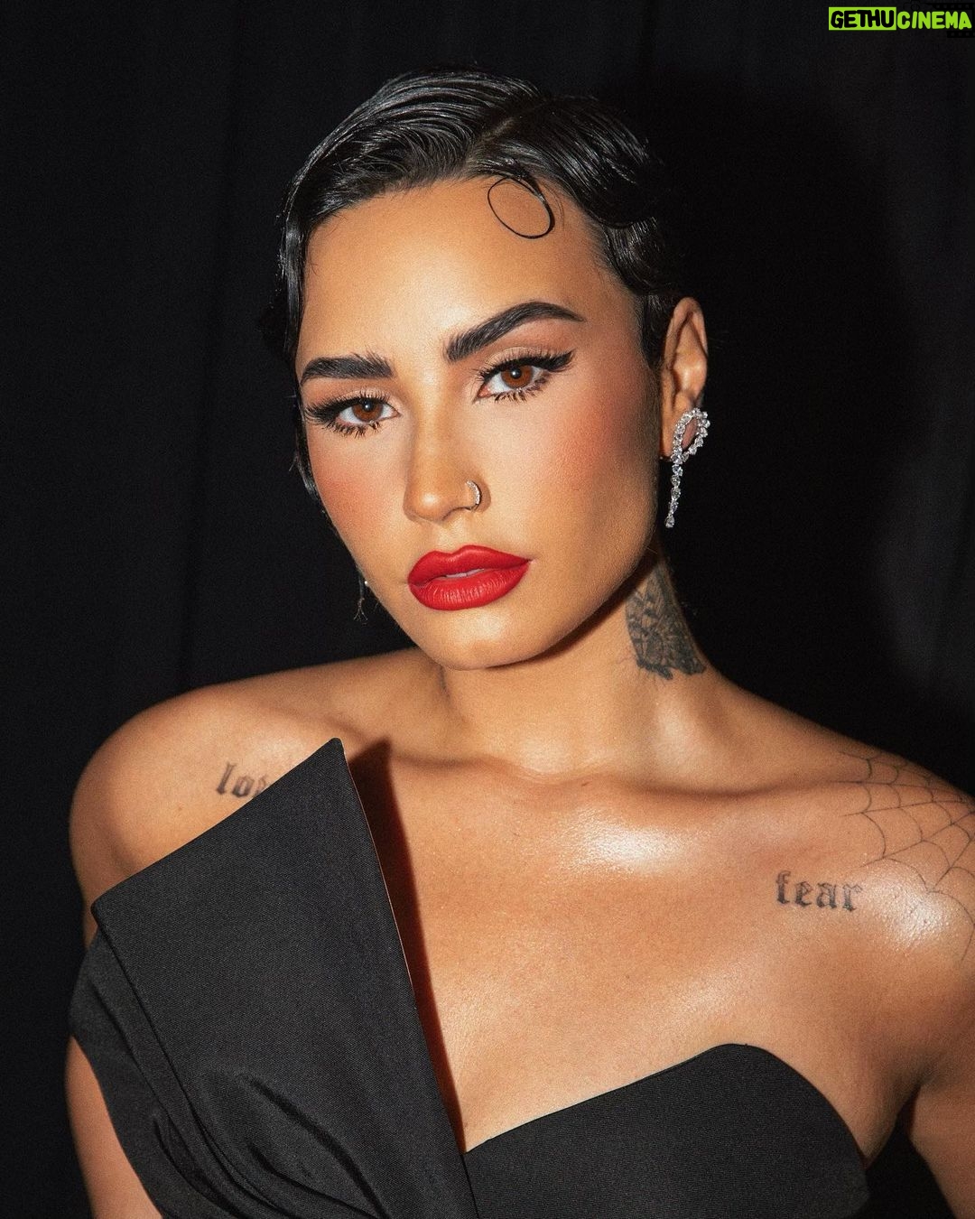 Demi Lovato - 1 Million Likes - I had a knee brace on under this gown 🤫