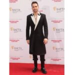 Dino Fetscher Instagram - Thank you so much for having me, @bafta Craft Awards 😍! What an honour to present both the Photography: Factual & Photography & Lighting: Fiction awards! Congrats to all the winners and nominees! . . . What an honour to spend an evening celebrating the formidable talent behind the camera! You guys are the real magic of this industry - without you, none of it would be possible. ♥️♥️♥️♥️♥️♥️ So THANK you. . . . Massive thanks as well to the gorgeous @thericawr for being my presenting partner in crime, my incredible publicist @tim.beaumont at @epilogueagency for having my back, @millermode for dressing me so wonderfully and my dear pal @maxbexroberts for being my date. . . . Thank you @moschino for the insanely cool outfit (I felt amazing) 😍, to @_sinum_ for the beautiful bling and to @all_is_on_ozer_ay for the amazing tailoring. . . . 📸 @gettyentertainment 👔 @millermode, wearing @moschino & @_sinum_ 💄 @pauldonovanhair & @seanwhiteaesthetics (Hydrafacial #gifted) . #BAFTACraftAwards