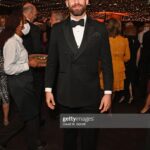 Dino Fetscher Instagram – Such a ball last night at the #UpNext Gala raising money for the @nationaltheatre! 

Thank you so much for my lovely evening wear @shopoliverbrown and @harrysoflondon! And @gettyimages for the pictures! 

Styled by the wonderful @johnarmour