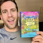 Dino Fetscher Instagram - 🌈✨TALES FROM BEYOND THE RAINBOW✨🌈 - Book & audiobook out today! . by Pete Jordi Wood. Audiobook voiced by me! @penguinukbooks . My very first audiobook! And what a magical journey it has been. From this wondrous book’s very first inception, by my clever friend Pete, where I voiced the amazing ‘Dog and the Sailor’ (from my bedroom cupboard in a bleak covid Narnia), to voicing the full thing, published today! I’m so honoured to be a part of it. . I can’t tell you how much I could have done with this book as a kid, and I’m so happy that the world now has it - because god knows we so desperately need it. . This book is truly brilliant. It’s the first collection of queer classic fairytales put to paper; tirelessly researched, honed and brought to life by @petejordiwood. Each story hails from a different part of the world, exploring a different country and culture with every tale. Each story has been created with a folklorist from that region to ensure it’s as close to the original as possible. They’re beautiful, enchanting and utterly transporting ✨ . You can buy #TalesFromBeyondTheRainbow now online and at all major book shops ♥️🌈✨