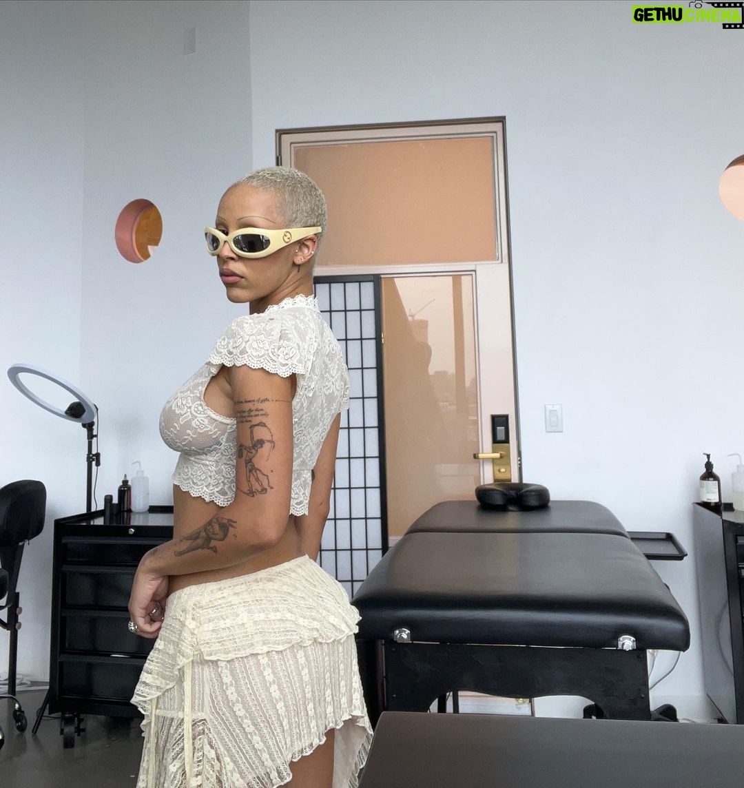 Doja Cat Instagram - hiding outfit pics under mundane every day life pics
