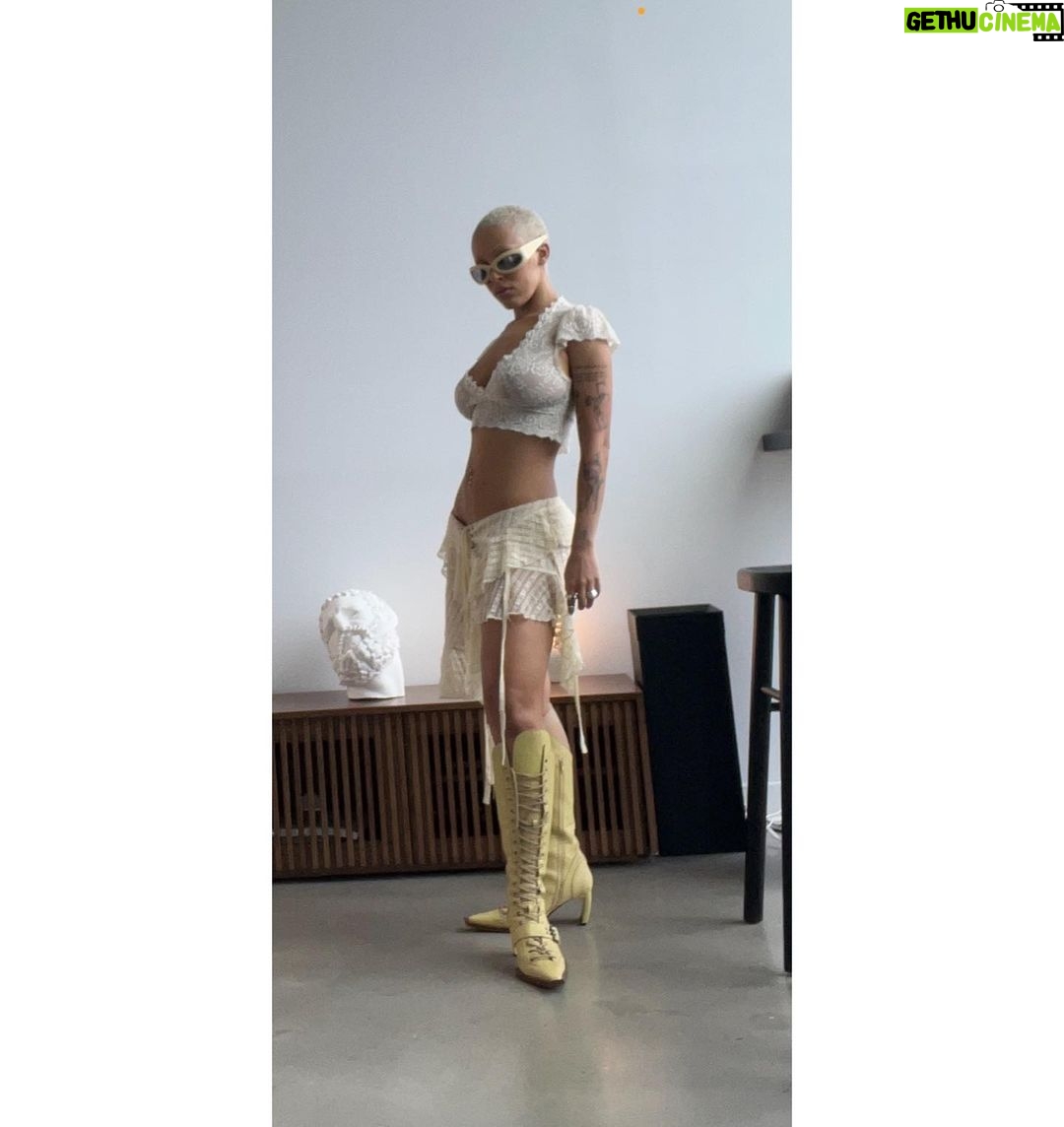 Doja Cat Instagram - hiding outfit pics under mundane every day life pics