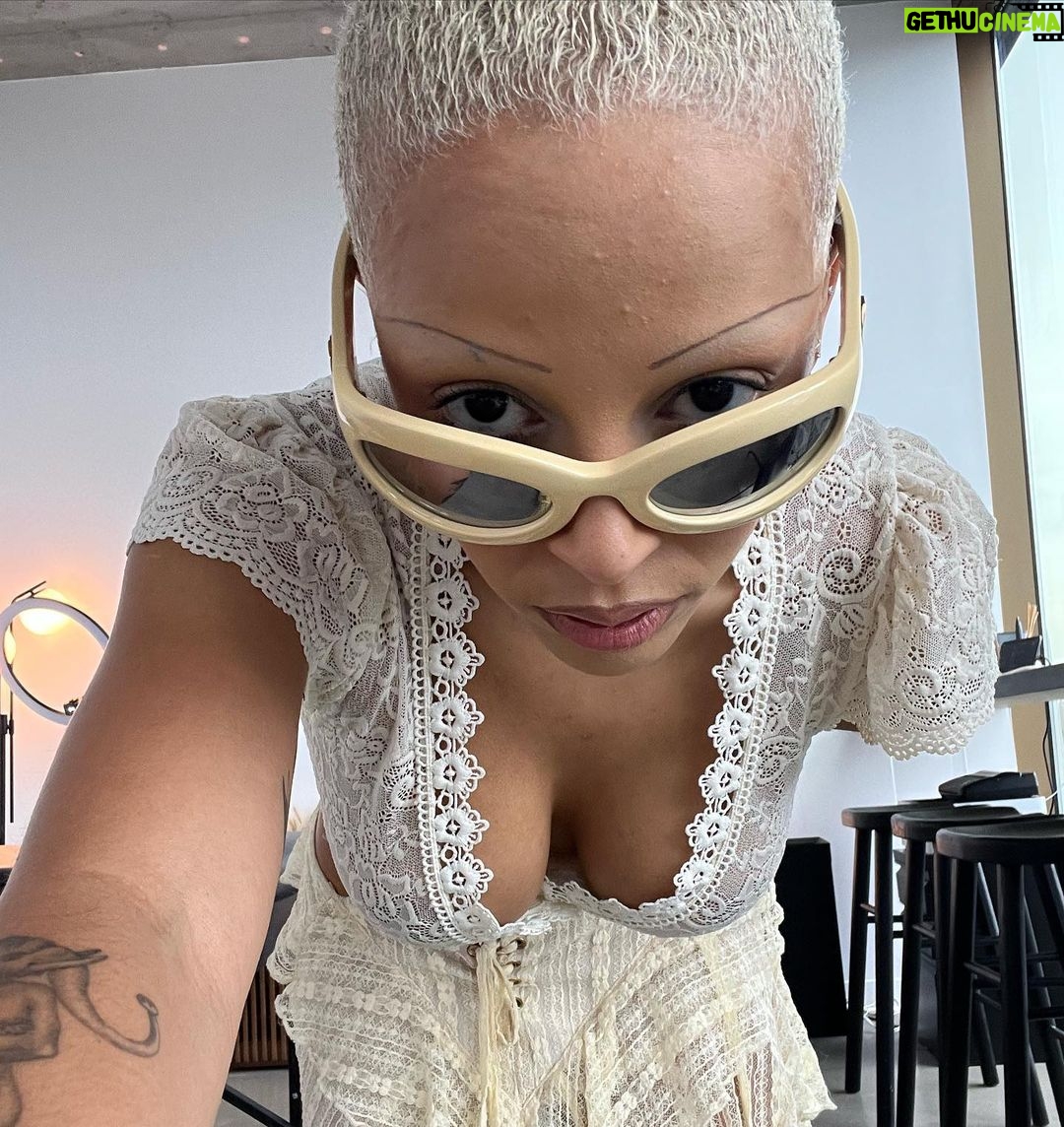 Doja Cat Instagram - hiding outfit pics under mundane every day life pics