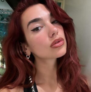 Dua Lipa Instagram - Happy Holidays from me to youuuuu❤️ sending love light health and happiness for the year ahead x