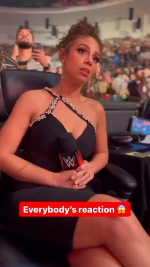 Dwayne Johnson Instagram - That “IF YA SMELLL” Rock music just hits the soul differently - especially when it’s a surprise
🤯😊💪🏾👊🏾

Awesome reaction from @samanthairvinwwe, who’s doing an amazing job on the mic for @wwe!🎤🔥
She’s a bad ass! 

#peopleschamp ✊🏾
