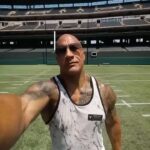 Dwayne Johnson Instagram - Thank you for the lessons, blessings and learnings 2023. We welcome 2024 with open arms 🤗 L.F.G. 🖤💪🏾🫱🏼‍🫲🏾 🥃 @stevierayvaughanofficial 🐐 🎸