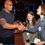 Dwayne Johnson Instagram - This is Grace Eline from @makeawishamerica She’s 16 and she’s awesome! Grace’s wish was to meet me. And I was lucky to meet her! Incredibly selfless young woman who is running her own organization that helps kids battling cancer - with support, love, positivity & KINDNESS. Amazing girl. I told her when I was 16 the only “running” I was doing was from the cops 😂👮🏽‍♀️🙋🏽‍♂️🤦🏽‍♂️ There’s a lot of good kids doing amazing things out there in the world, and Grace is one of them. #MakeAWishDay #21Kids #BestDayEver