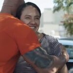Dwayne Johnson Instagram - Took this lovely lady 10minutes to finally take the cash I’m giving her 😂 Such a sweet moment 🤗🙏🏾 Despite all the negativity and noise we see daily - there’s still good people, doing good things out there in the world. My buddy @IsaiahGarza has been helping me find these good folks. Strangers gave him $7 bucks - and I wanted to pay it forward by giving it back to them with a few more zeros. @Acorns and I want to keep paying it forward - so sign up now for the Mighty Oak Debit Card (before 3/31/24), and you’re automatically entered for a chance to win one of our SEVEN $50,000 Mighty Paychecks. HAPPY NEW YEAR!! @Acorns #MightyOak Terms Apply Dwayne Johnson is a Director of Acorns Labs, LLC.
