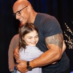 Dwayne Johnson Instagram – This little girl’s smile, eyes and mana just stole my heart ❤️

this is Chelsea Craig from @makeawishamerica.
She’s 9 and she’s awesome. 

Chelsea’s wish was to meet me. 

Our entire time together, all she did was just stare at me, smile and giggle (like Kevin Hart) 🤭🥰

Literally she said less than 10 words 😁
But her eyes, smile and energy said it all though. 

These are crazy toxic times – but there’s still a lot of positivity and good things out there in the world — and little Chelsea is one of them. 

To me, stuff like this will always be the best part of my fame. 

#MakeAWishDay
#21Kids 
#BestDayEver