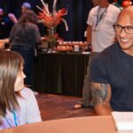 Dwayne Johnson Instagram - This little girl’s smile, eyes and mana just stole my heart ❤️ this is Chelsea Craig from @makeawishamerica. She’s 9 and she’s awesome. Chelsea’s wish was to meet me. Our entire time together, all she did was just stare at me, smile and giggle (like Kevin Hart) 🤭🥰 Literally she said less than 10 words 😁 But her eyes, smile and energy said it all though. These are crazy toxic times - but there’s still a lot of positivity and good things out there in the world — and little Chelsea is one of them. To me, stuff like this will always be the best part of my fame. #MakeAWishDay #21Kids #BestDayEver