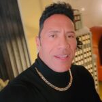 Dwayne Johnson Instagram - Merry Christmas, from your keepin’ it 💯 friend. 90’s Rock 🖤🎄👊🏾 🥃 #TappinFannys 👋🏾