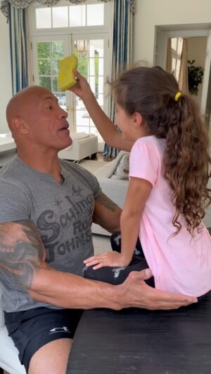 Dwayne Johnson Instagram - Rules are rules ✔️
Whoever drops cuss words in the Johnson household, must suffer the consequences of a nasty soaped up sponge in the mouth 🧼 🧽 

Not surprisingly, the guilty one always happens to be Dwanta Claus 🎅🏾🤣🥃