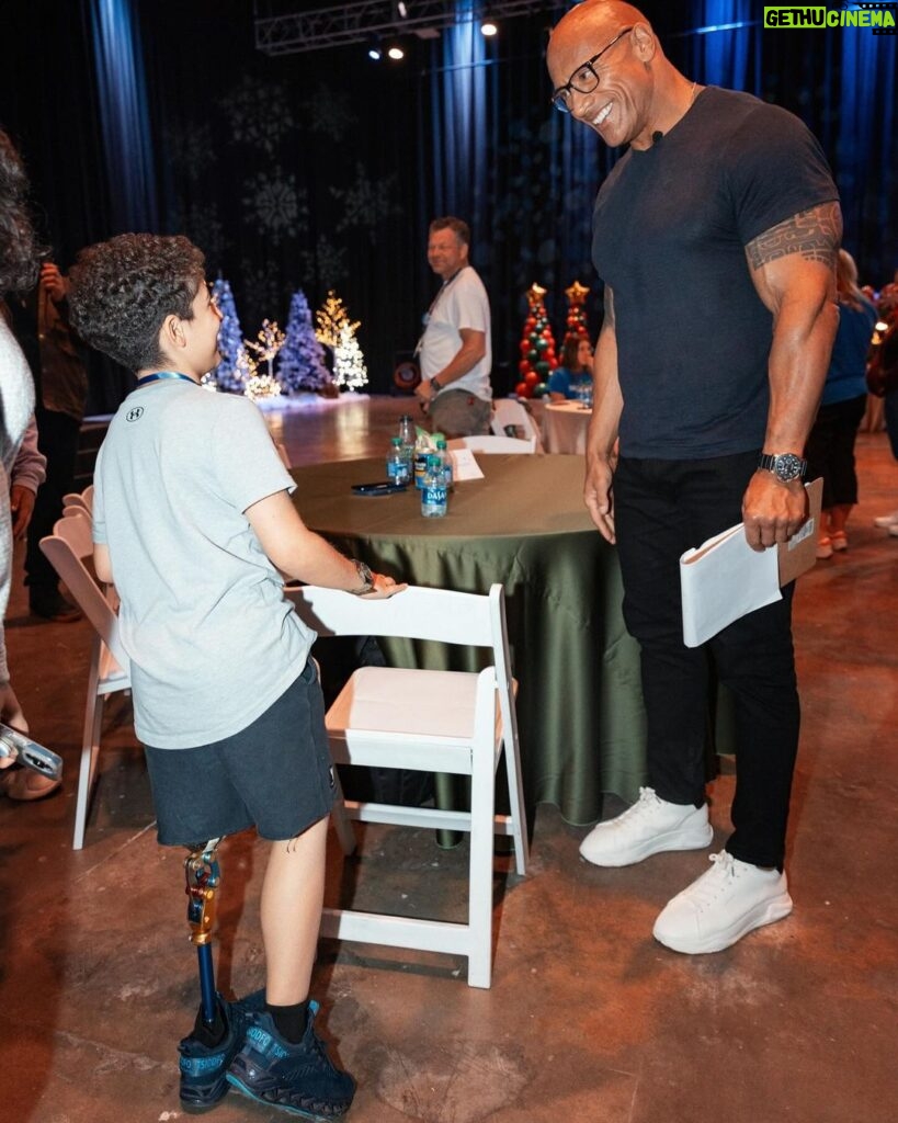Dwayne Johnson Instagram - This is Kamran ‘Buddy’ Golesorkhi from @makeawishamerica. He’s 9yrs old and he’s awesome. Buddy’s wish was to meet me. He was so proud - rightfully so - to show me his insanely cool new prosthetic leg🦿👏🏾👏🏾👊🏾 Wish I was as cool as Buddy but that’s what makes him special. Lots of positive and good stuff still happens in this world and Buddy is one of them. #MakeAWishDay #21Kids #BestDayEver