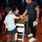 Dwayne Johnson Instagram – This is Kamran ‘Buddy’ Golesorkhi from @makeawishamerica. 

He’s 9yrs old and he’s awesome. 

Buddy’s wish was to meet me. 

He was so proud – rightfully so – to show me his insanely cool new prosthetic leg🦿👏🏾👏🏾👊🏾

Wish I was as cool as Buddy but that’s what makes him special. 

Lots of positive and good stuff still happens in this world and Buddy is one of them. 

#MakeAWishDay
#21Kids 
#BestDayEver
