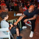 Dwayne Johnson Instagram - This is Kamran ‘Buddy’ Golesorkhi from @makeawishamerica. He’s 9yrs old and he’s awesome. Buddy’s wish was to meet me. He was so proud - rightfully so - to show me his insanely cool new prosthetic leg🦿👏🏾👏🏾👊🏾 Wish I was as cool as Buddy but that’s what makes him special. Lots of positive and good stuff still happens in this world and Buddy is one of them. #MakeAWishDay #21Kids #BestDayEver