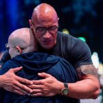 Dwayne Johnson Instagram – This is Adelaide Bomberger from @makeawishamerica. 

She’s 17 and awesome. 

Adelaide’s wish was to meet me, beat me at arm wrestling, and do our VERY special bald head touch handshake – so I can have the honor of joining her “bad ass team bald club”. 

She succeeded at all three 3️⃣ ☑️ 🥰 

Amazing kid. 
I’m lucky to meet her. 

Stay strong Adelaide — you inspire everyone around you, including me. 

A lot of positive and good stuff still happening around the world, and Adelaide is one of them. 

#MakeAWishDay
#21Kids 
#BestDayEver