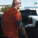 Dwayne Johnson Instagram – Hand to hand 🫱🏼‍🫲🏾 
(I’m a sucker for this stuff 🙋🏽‍♂️) 

Surprise to this amazing mama!! 
Newly divorced, single mom, working hard to raise two young boys. 

My good buddy and amazing soul @isaiahgarza helped me find some good people willing to give him $7bucks, then when they met me (surprise) I added a few more zeroes and gave it back to them. 

I was inspired to do this from an investment I made in a financial wellness company called @Acorns, and we created a great debit card called “The Mighty Oak” as a way to help people gain financial independence. 
Slow and steady – like an oak. 

I want you to sign up for the Mighty Oak Debit Card (before 3/31/24), so you can be automatically entered for a chance to win ONE of our SEVEN $50,000 Mighty Paychecks.

I stayed creepy and surprised 🤣 some more good folks with $7,000 as well as surprising a beautiful family with $50,000. 
Awesome stuff. 
More to come ❤️🙏🏾

Merry Christmas!! 

@Acorns 
#MightyOak
#termsapply