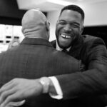 Dwayne Johnson Instagram - Very cool (and emotional) moment to share with the legendary GOAT @jimmyjohnson4616 - giving Jimmy his flowers for his induction into the @dallascowboys RING OF HONOR. This @nflonfox team is the best in the business and what a moment I was very grateful and privileged to share with them. @michaelstrahan @jayglazer Howie Long Terry Bradshaw Curt Menefee @foxsports @canesfootball #UFL