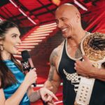 Dwayne Johnson Instagram – She wears black.
I love black. 
She’s a bad ass. 
And I got famous for wearing a fanny pack. 
We had fun f*cking around backstage 😈🥃

Love, appreciate and respect you champ @rhearipley_wwe – thanks for trusting me with your title, keep kickin’ ass and raising the bar 🖤💪🏾

Big shout to @cathykelley for being a total pro and having fun 🎤 👊🏾

#peopleschamp ✊🏾

📸 @flanneryunderwood @wwe