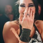 Dwayne Johnson Instagram – She wears black.
I love black. 
She’s a bad ass. 
And I got famous for wearing a fanny pack. 
We had fun f*cking around backstage 😈🥃

Love, appreciate and respect you champ @rhearipley_wwe – thanks for trusting me with your title, keep kickin’ ass and raising the bar 🖤💪🏾

Big shout to @cathykelley for being a total pro and having fun 🎤 👊🏾

#peopleschamp ✊🏾

📸 @flanneryunderwood @wwe