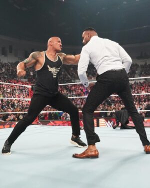 Dwayne Johnson Instagram - Energy. Vibe. Mood. 
Grateful for the connection. 
More to come. 
#peopleschamp ✊🏾

📸 @flanneryunderwood @wwe