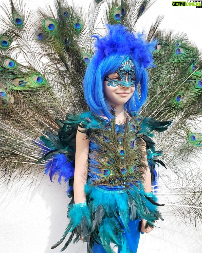 Elisabetta Fantone Instagram - She deserves her own post! During last year's Halloween after being Wednesday from the Addams Family my daughter @abbielondon.co decided she wanted to be a peacock for this year's Halloween. I absolutely love this little girl's mind and originality. She always wants to be different. She committed to the idea all year. So like every year, I decided to make her a unique costume. I promised her that I would turn her into the most beautiful peacock. I created and sewed every piece from head to toe by hand and made the tail so she could lift it. She played the part all night like a true showgirl. She won best costume at our neighborhood's costume contest and that made her night! 🎃 Hope you all had an amazing #Halloween #HalloweenCostume #Peacock #PeacockCostume #HappyHalloween #peacockfeathers #feathers