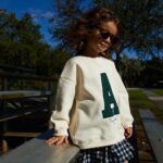 Elisabetta Fantone Instagram - Children are likely to live up to what you believe of them. I believe the world in her. @abbielondon.co 🌾 Captured by: @kristinanstephens #kidsfashion #kidsphotography
