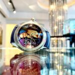 Elisabetta Fantone Instagram – One of my two @corumwatches design. The #Monalisa #BubbleWatch 
This was one of my many favorite collaborative projects which I got to present in #Switzerland 
The watch was sold in limited edition across the globe.
Corum gave me full artistic freedom to develop and design both the watch and the case. The watch represents the Monalisa which became the victim of what has been described as the greatest art theft of the 20th century thus making her a media sensation. The watch case represents the Louvre Museum.
What an honor it was to collaborate with such a reputable and luxurious watch brand. 

#luxurytimepieces #luxurywatch #watches #collectionwatch #Monalisa #Louvre #watchcollection #corumwatches