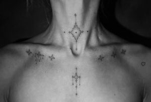 Eliza Coupe Instagram - Since many of you asked…. Yes, this is a real tattoo. Breathe. It’s fine. 
This otherworldly piece of ethereal art was given to me by the one and only stunning little sorceresses @0wlita of @cosmic.blueprints 
So grateful for her activating light-codes via her cosmic ink flow. 
Gracias Mi amor! 
🖤

#tattoo #cosmic #cosmicblueprint #light #ink #necktattoo #chesttattoo #sorrymum #alsosorrydad #alsosorrynotsorry #tinytattoo #digeridoo #itjustrhymed #ootd  #nolimits #truth #thyroidlove #speakyourtruth #zerofucks #trust #turtlenecksforauditionsitsfine #letgo
 #BE 🖤