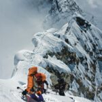 Elizabeth Chai Vasarhelyi Instagram - Friends I'm so excited to say that @jimmychin gorgeous photo book debut is in stores now. Long overdue I'm so proud of this work and the opportunity to hear some of the stories behind his most iconic images. It's 20 years of transcendent work that documents this life on the edge that Jimmy created for himself (before I came along with the kids and blew everything up) - there and back again: photographs from the edge. Link in bio!