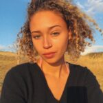 Ella-Rae Smith Instagram - golden sunshine in dorset ☀️ here for the month to shoot @marley_morrison’s beautiful @sweetheart_film 🍬🧡 spending the last few days of a summer in the middle of the countryside with near to no phone signal, so less screen staring and more nature, sea swims and movie making 🕺🏽✨ Dorset