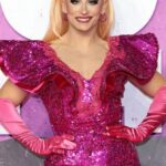Ella Vaday Instagram – ✨ Stepping onto the pink carpet at the world premiere of Sumotherhood at @cineworldlsq 🌟 A true privilege to share the screen with this incredible cast and bring some extra sparkle as the only drag queen in the movie. 💃🎥 #Sumotherhood #PremiereNight #DragRoyalty

Hair @benjaminpaulhair @howsyourheadwigs 
Outfit @folx.atelier 
Shoes @houseofmattia.co.uk 
Contacts @anesthesialenses.official @lensdotme_official