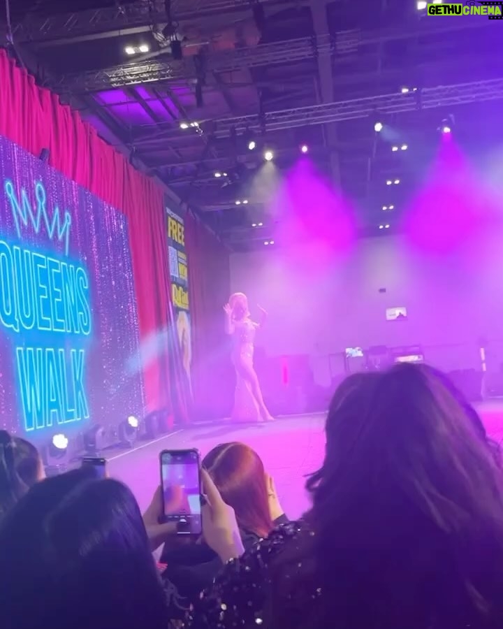 Ella Vaday Instagram - @rupaulsdragcon 2024 was an absolute blast! Always love it as it gives you a chance to meet so many people that support you as well as hundreds of fellow drag racers from across the globe, there’s nothing quite like it! Thankyou all for coming to see me, I personally have a fear of my birthday for fear no one will show up, so imagine my anxiety for dragcon each time!!! Early mornings, and long days in full glam and heels, went so quickly thanks to the lovely people that came to see me. Massive thanks too to my lovely BF and @vivianbambam for helping run my booth, anyone that visited will agree they are THE BEST! ❤️ Dress @the_drag_room Hair @venus.nv , wig base @howsyourheadwigs Pic 1&2 @stunnin.mag Merch pics by @owenjamesvincent Video @laurenladuca