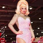 Ella Vaday Instagram - @rupaulsdragcon 2024 was an absolute blast! Always love it as it gives you a chance to meet so many people that support you as well as hundreds of fellow drag racers from across the globe, there’s nothing quite like it! Thankyou all for coming to see me, I personally have a fear of my birthday for fear no one will show up, so imagine my anxiety for dragcon each time!!! Early mornings, and long days in full glam and heels, went so quickly thanks to the lovely people that came to see me. Massive thanks too to my lovely BF and @vivianbambam for helping run my booth, anyone that visited will agree they are THE BEST! ❤️ Dress @the_drag_room Hair @venus.nv , wig base @howsyourheadwigs Pic 1&2 @stunnin.mag Merch pics by @owenjamesvincent Video @laurenladuca
