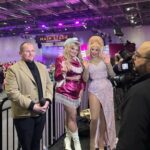 Ella Vaday Instagram - @rupaulsdragcon 2024 was an absolute blast! Always love it as it gives you a chance to meet so many people that support you as well as hundreds of fellow drag racers from across the globe, there’s nothing quite like it! Thankyou all for coming to see me, I personally have a fear of my birthday for fear no one will show up, so imagine my anxiety for dragcon each time!!! Early mornings, and long days in full glam and heels, went so quickly thanks to the lovely people that came to see me. Massive thanks too to my lovely BF and @vivianbambam for helping run my booth, anyone that visited will agree they are THE BEST! ❤️ Dress @the_drag_room Hair @venus.nv , wig base @howsyourheadwigs Pic 1&2 @stunnin.mag Merch pics by @owenjamesvincent Video @laurenladuca