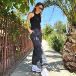 Ellen Hancock Instagram - Fully forced my mom to be my photographer today bless her for tolerating me 😂 Pants and sunnies @freepeople Top @goodamerican Shoezies @converse Los Feliz