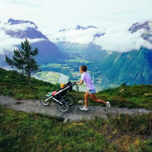 Emelie Forsberg Instagram - When Ylva-Li, 2 yo gets to follow on a run, she is so happy! Every day she want to go for at least  a walk and her nap she prefers there too 🥰!
I still really enjoy bringing the girls on a run, even though nowadays flat is better than uphill. This is @thule glide 2! 
#bringyourlife ⬅️ Love this tag ❤️
@thule_family
📸 @kilianjornet